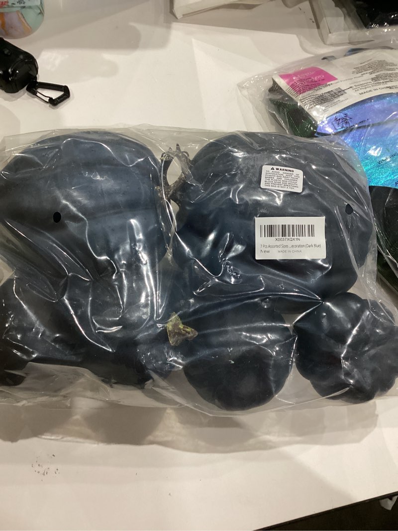 Condition photo showing Good Condition for Winlyn 7 Pcs Assorted Sizes Navy Blue Artificial Pumpkins Decorative Dark Blue Pumpkins Faux Foam Pumpkins for Gifts Fall Baby Shower Thanksgiving Halloween Table Centerpiece Shelf Mantel Decoration