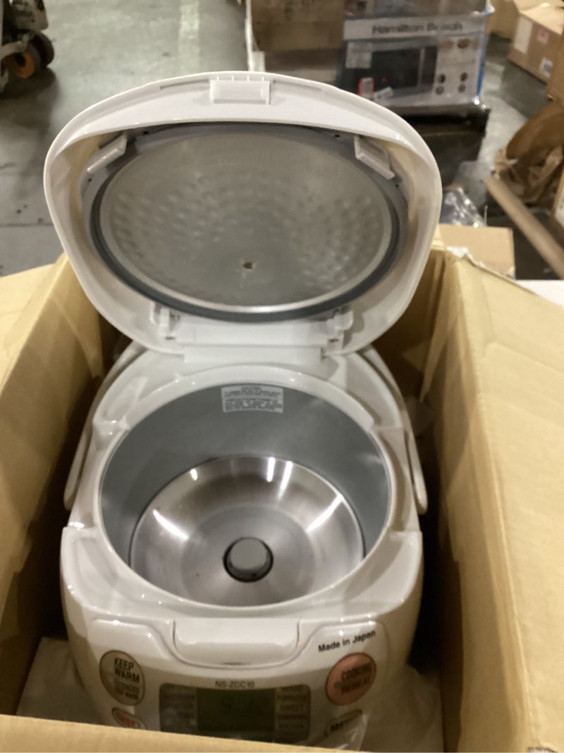 Condition photo showing As Is for Zojirushi NS-ZCC10 5-1/2-Cup Neuro Fuzzy Rice Cooker and Warmer, Premium White 5.5-Cup uncooked rice