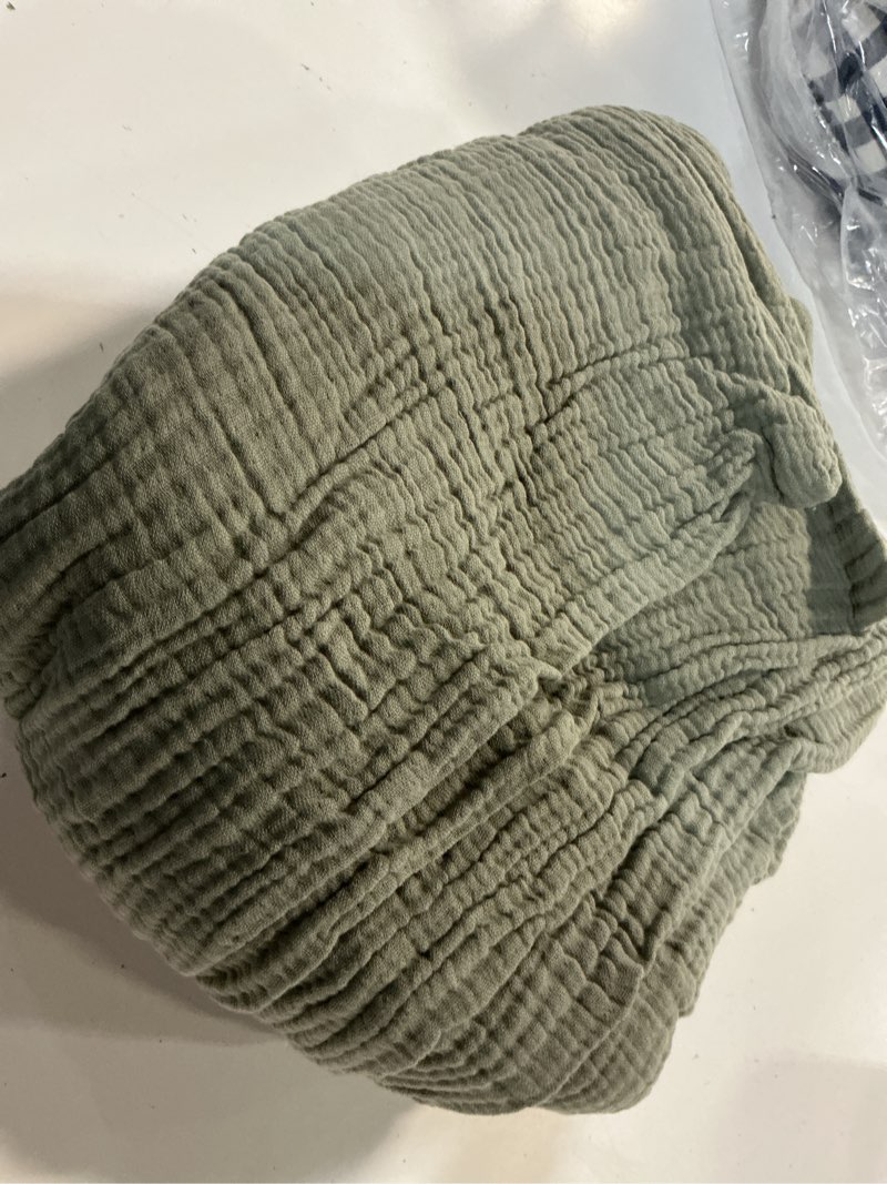 Condition photo showing As Is for organic cotton gauze dream quilt set, king/cal king, dried sage