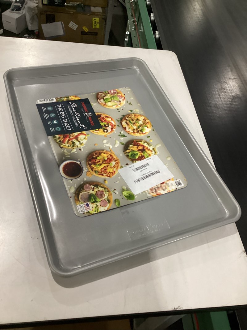 Condition photo showing Good Condition for nordic ware brilliant™ colorful bakeware 21 x 15 extra large sheet pan, nonstick made without pfas or ptfe for safe cooking; reinforced steel rim prevents warping big sheet