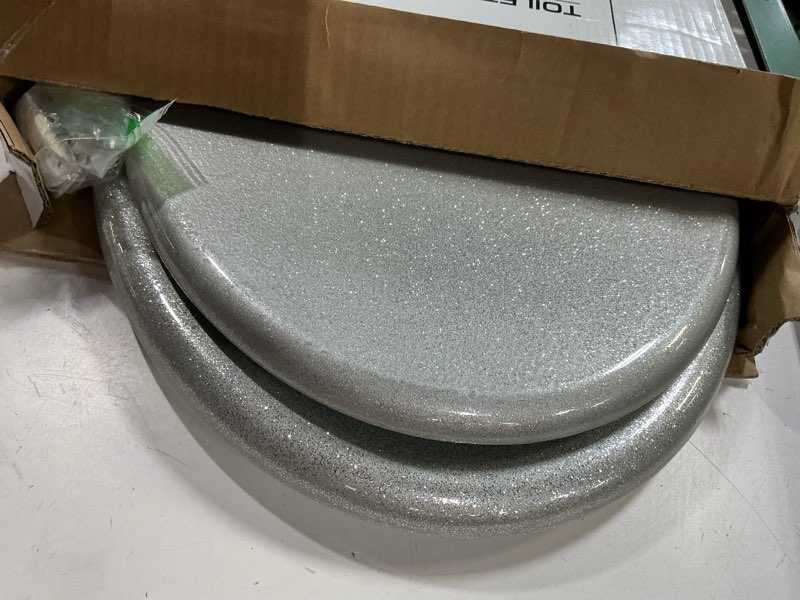 Condition photo showing Good Condition for angol shiold glitter toilet seat molded wood elongated toilet seat with quietly close and quick release hinges, easy to clean also easy to install (elongated 18.5'', silver) elongated 18.5‘’ silver