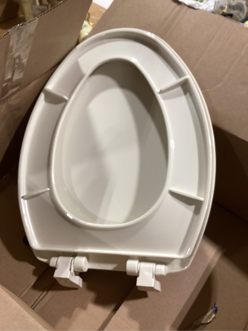 Condition photo showing Good Condition for kohler 20110-96 brevia, slow close toilet seat, elongated toilet seat, grip-tight bumpers quick-attach hardware, biscuit biscuit elongated quiet-close