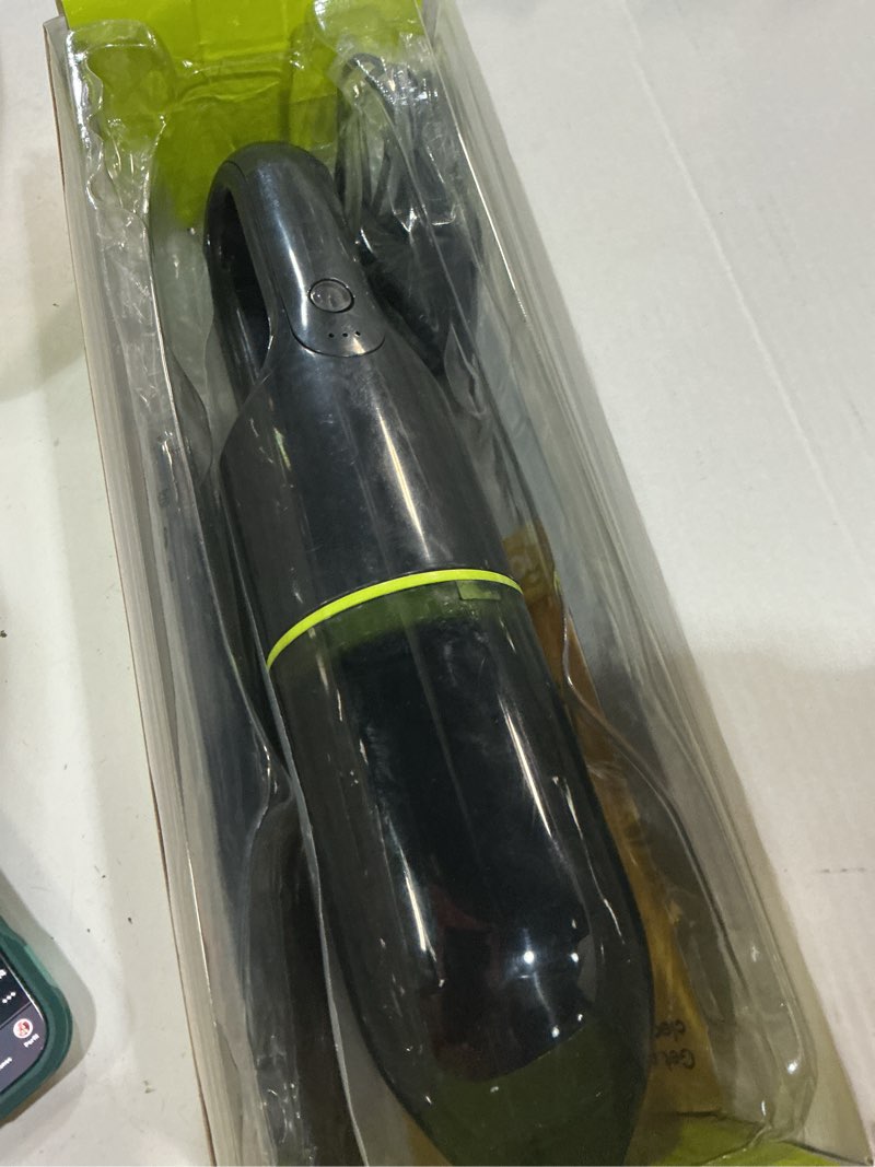 Condition photo showing As Is for ionvac handvac handheld cordless vacuum, pet-friendly multi-surface lightweight vacuum cleaner with usb charging, model #7441, green