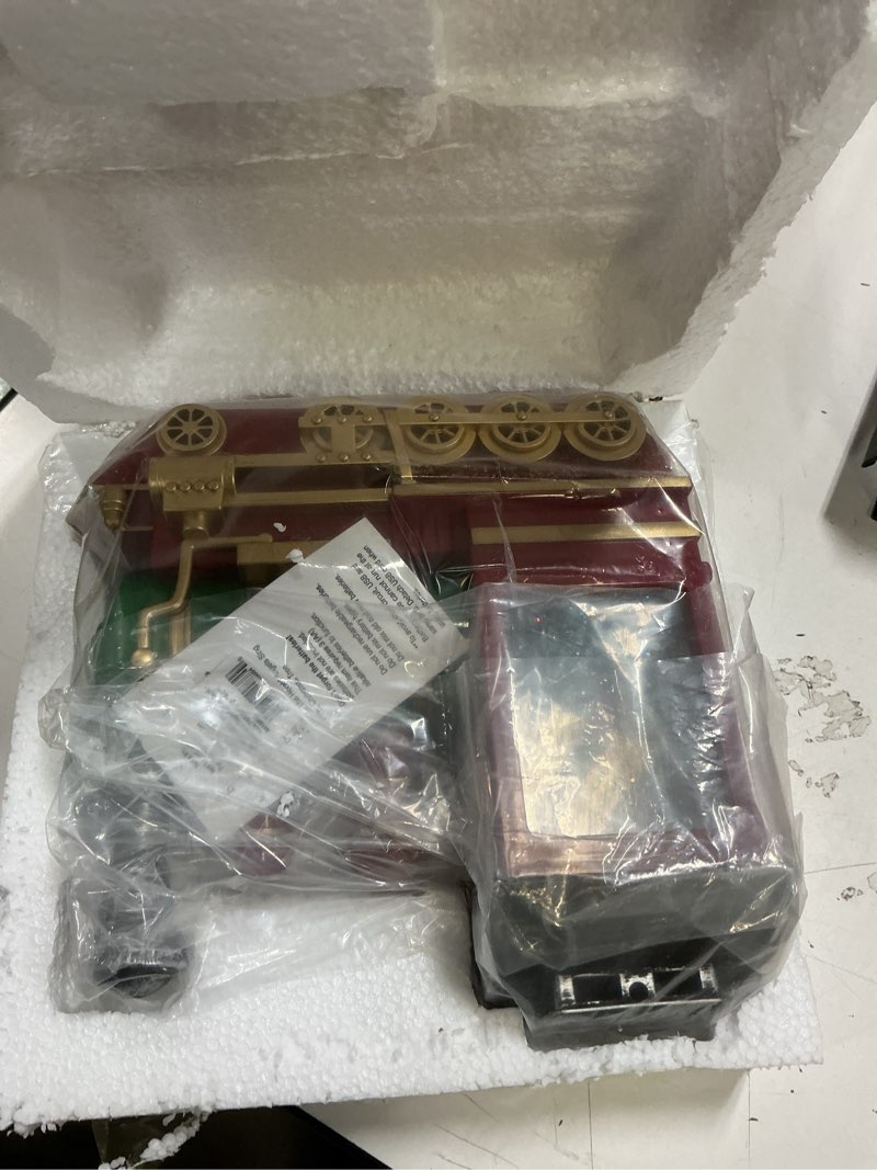Condition photo showing New/Like New for Raz Imports Conductor Santa Musical Lighted Water Train, 8.75-inch Length, Christmas Holiday Decor