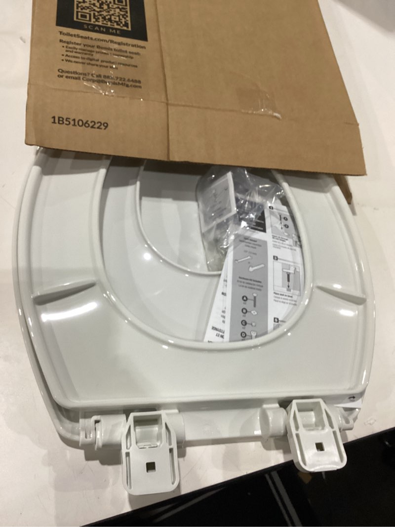Condition photo showing Good Condition for Mayfair Little2Big? Elongated Plastic Toilet Seat in White with STA-TITE? Seat Fastening System? and Whisper•Close? Hinge