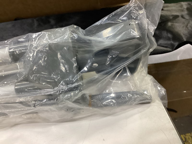 Condition photo showing As Is for Grey plastic tripod 