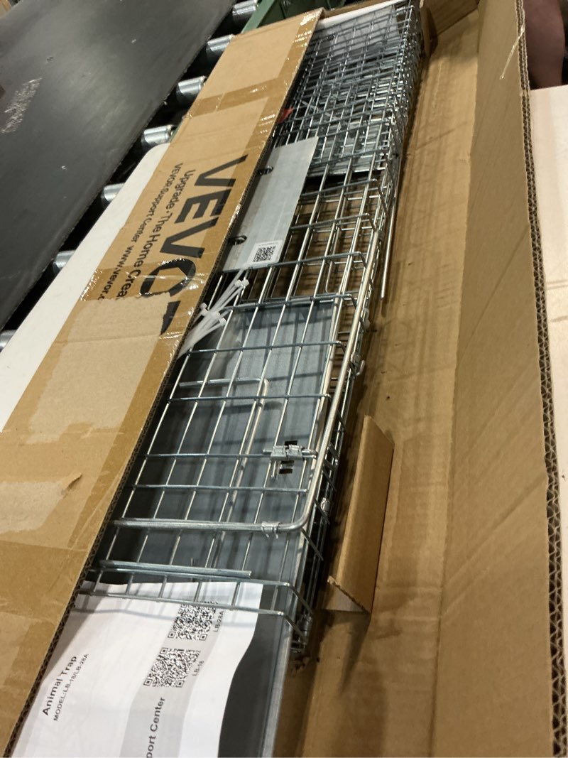 Condition photo showing Good Condition for vevor live animal cage trap, 31" x 10" x 12" humane cat trap galvanized iron, folding animal trap with handle for rabbits, stray cats, squirrels, raccoons, groundhogs and opossums