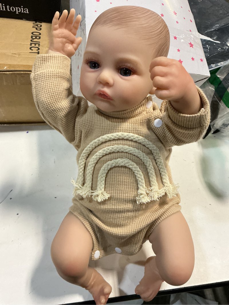 Condition photo showing Good Condition for (( missing pieces))WOOROY Realistic Reborn Baby Dolls - 18 Inch Lifelike Newborn Baby Girl, Real Life Baby Dolls with Soft Weighted Body, Real Baby Reborn Gift Set for Kids Age 3 Brown