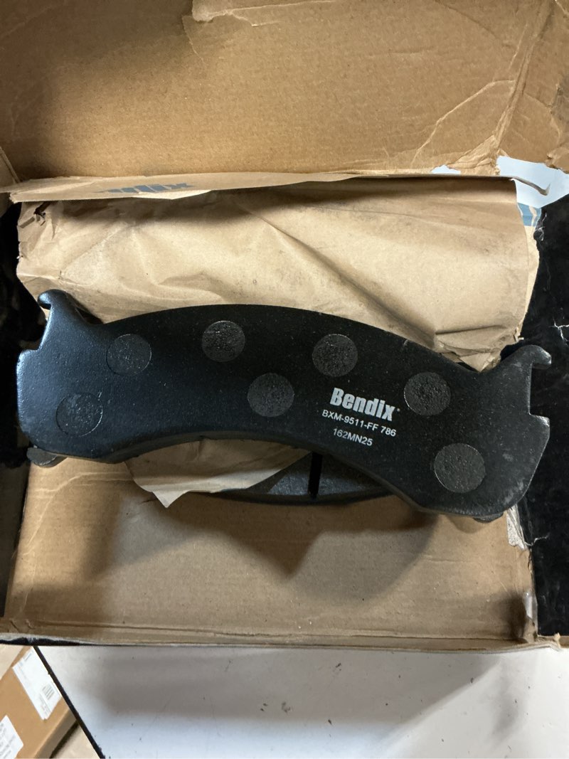 Condition photo showing As Is for disc brake pad set