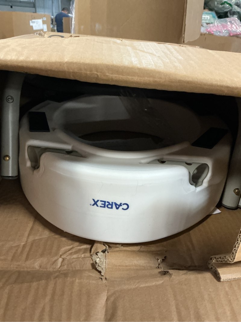 Condition photo showing Good Condition for carex 3.5 inch raised toilet seat with arms, elongated toilet seat riser, up to 250 lbs capacity, elevating & raising seat for elderly & handicap, universal, slip-resistant with padded handles, white