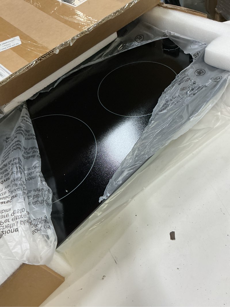 Condition photo showing Good Condition for karinear 4 burner electric cooktop 24 inch, built-in stove top, 220-240v radiant cooktop with knob control, residual heat indicator, over-temperature protection, hard wire(no plug)