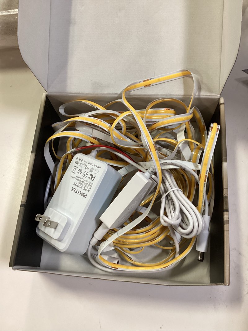 Condition photo showing As Is for PAUTIX COB LED Strip Nautral White,4000K Dimmable LED Tape Light,CRI93+ Super Bright High Lumen,Compatible with Alexa/Google Assistant,Flexible Strip Ligths for Bedroom,Kitchen,Office,Under Cabinet 4000K-32.8ft/10m(Smart Wi-Fi)