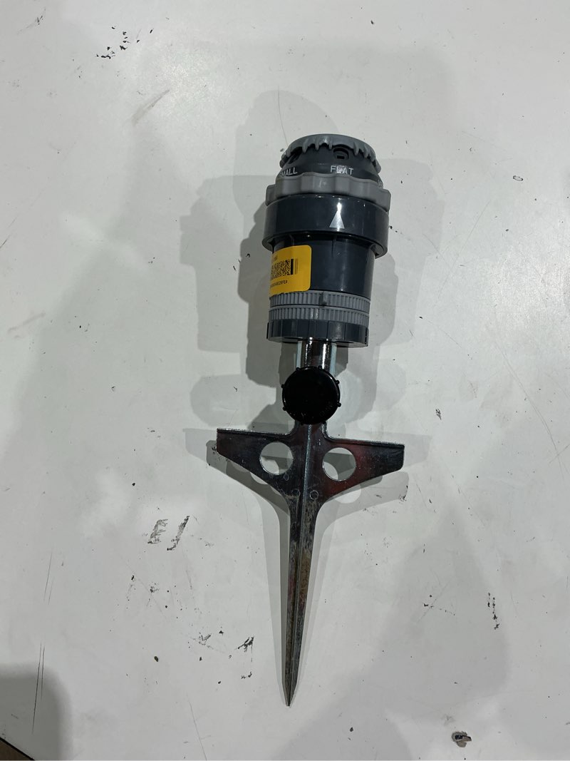 Condition photo showing As Is for orbit h2o-6 5000-sq ft rotating spike lawn sprinkler