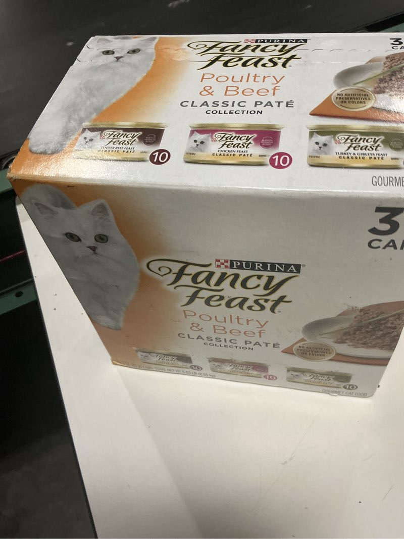 Condition photo showing New/Like New for ( bbd 02/2028)  fancy feast poultry and beef feast classic pate collection grain free wet cat food variety pack - (pack of 30) 3 oz. cans