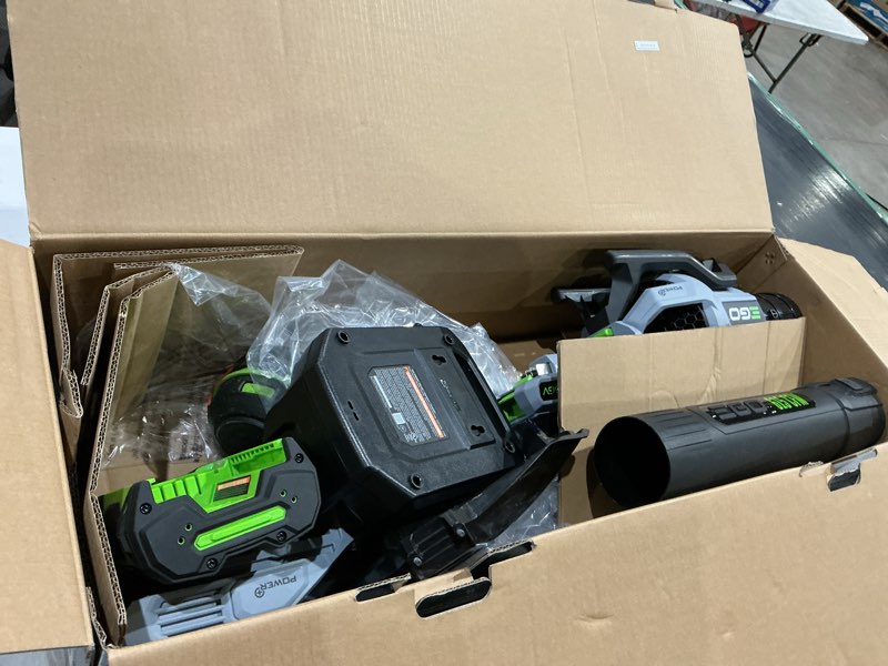 Condition photo showing As Is for ego power+ battery blower/trimmer kit (battery & charger)