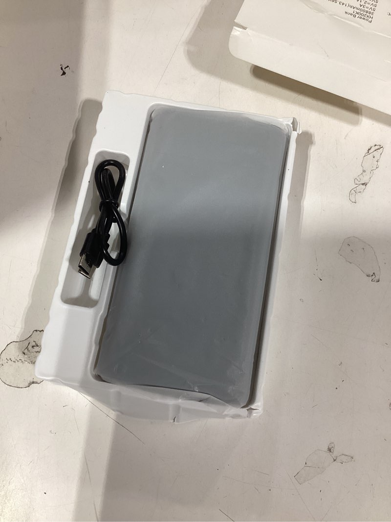 Condition photo showing Good Condition for Similar product Amazon Basics High-Capacity Portable Charger Power Bank with 3-Port Output, 20,000 mAh, Black 20000 mAh