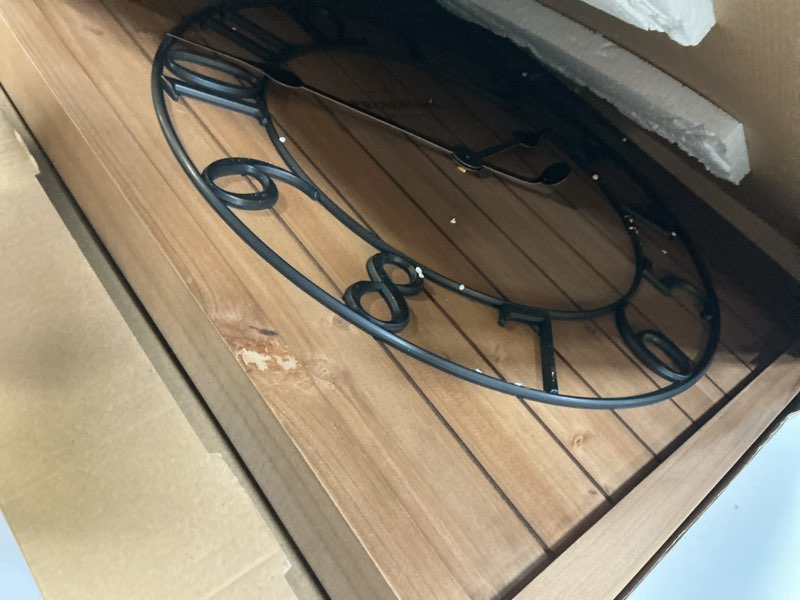 Condition photo showing Good Condition for Presentime & Co Farmhouse Barn Door Clock, Shiplap Style, Brown Wood Color, Silent No Ticking, 3D Arabic Numeral, 23" H x 21" W. Home Decoration/Wall Decoration/Farmhouse Décor