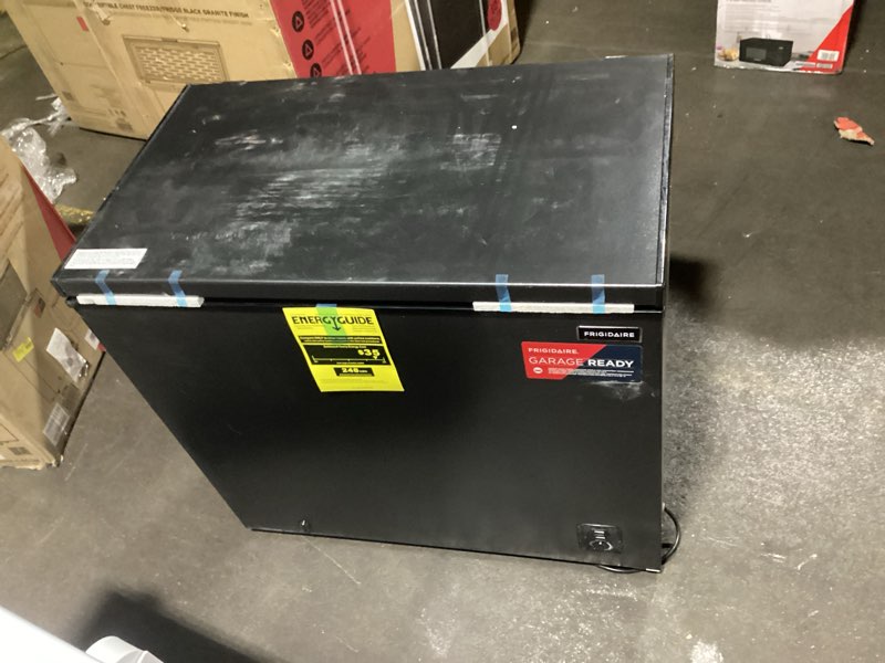 Condition photo showing As Is for Frigidaire Chest Deep Freezer, 5.0 Cu. Ft. Capacity, Adjustable Thermostat-Removable Vinyl Coated Wire Basket-Easy Defrost Drain- Garage Ready- Pearl White 5 cu ft