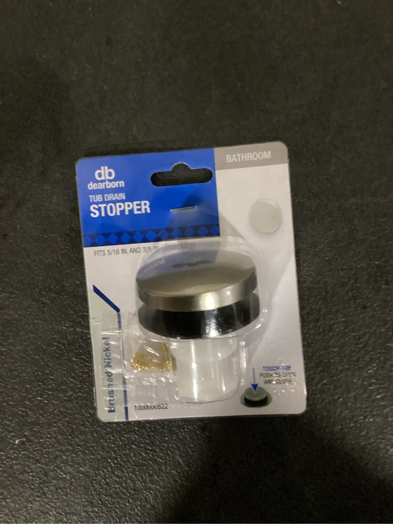 Condition photo showing As Is for dearborn touch toe stopper - brushed nickel