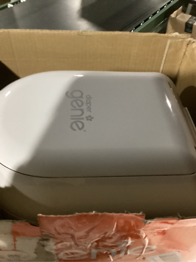Condition photo showing Good Condition for Diaper Genie Platinum Pail (Lily White) is Made in Durable Stainless Steel and Includes 1 Easy Roll Refill with 18 Bags That can Last up to 5 Months.