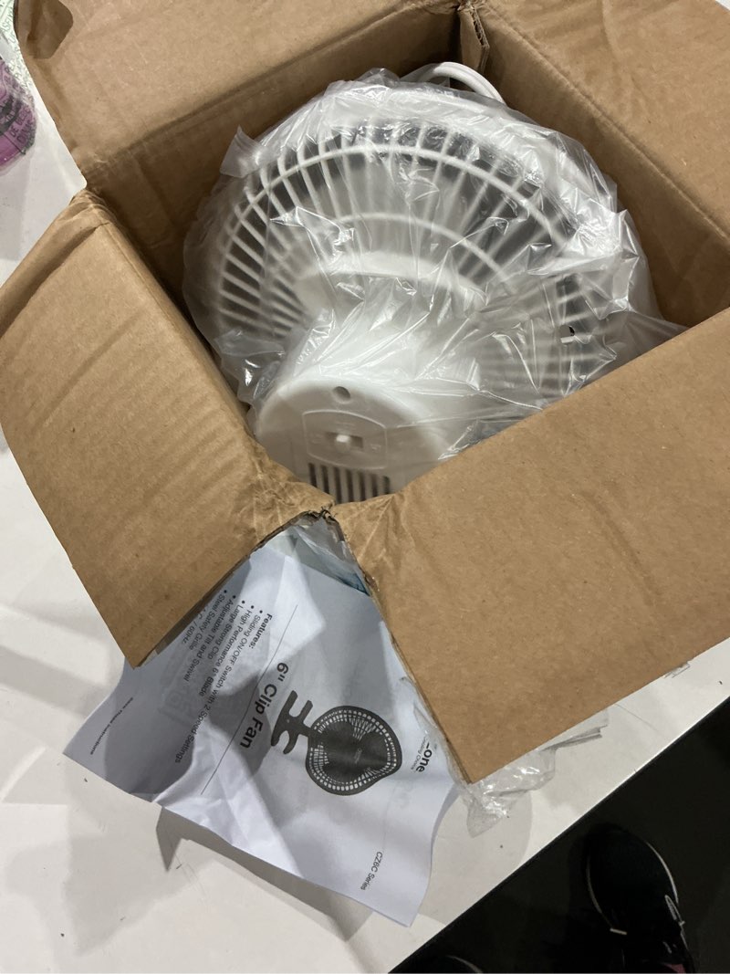 Condition photo showing Good Condition for comfort zone portable clip on fan with fully adjustable tilt, electric, 6 inch, quiet, indoor, 2 speed, mini desk fan, table fan, airflow 6.53 ft/sec, ideal for home, bedroom, dorm & office, cz6c white 6"