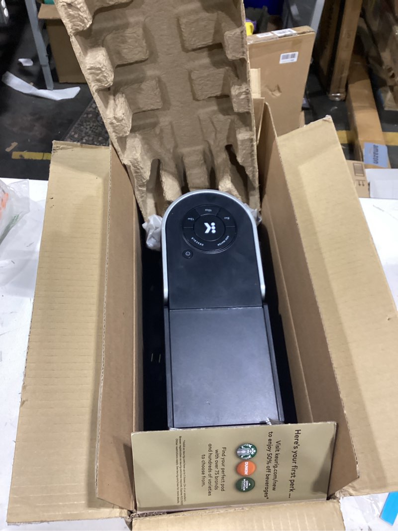 Condition photo showing As Is for keurig k-slim single serve k-cup pod coffee maker, multistream technology, 3 brew sizes, slim and sleek design, 46oz removable reservoir, black