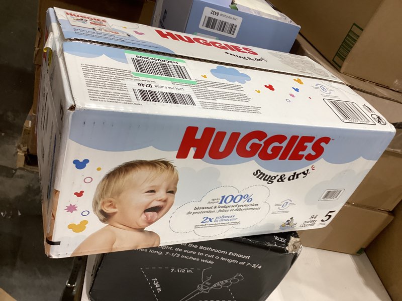 Condition photo showing New/Like New for huggies size 5 diapers, snug & dry baby diapers, size 5 (27+ lbs), 84 count, packaging may vary size 5 84