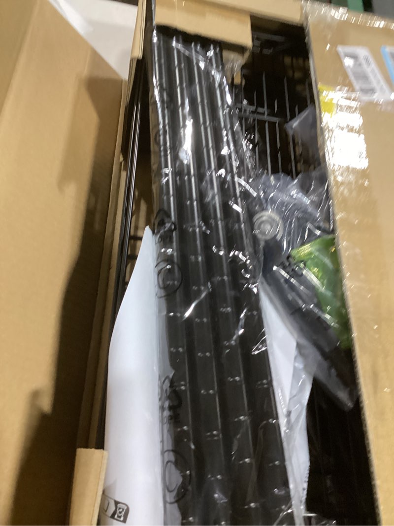 Condition photo showing item condition for Amazon Basics 4-Shelf Steel Wire Rack, 13.4 D x 23.2 W x 48 H in, Black | Sturdy, Adjustable, Easy Assembly, Storage 4-Shelf Black 13.4" D x 23.2" W x 48" H