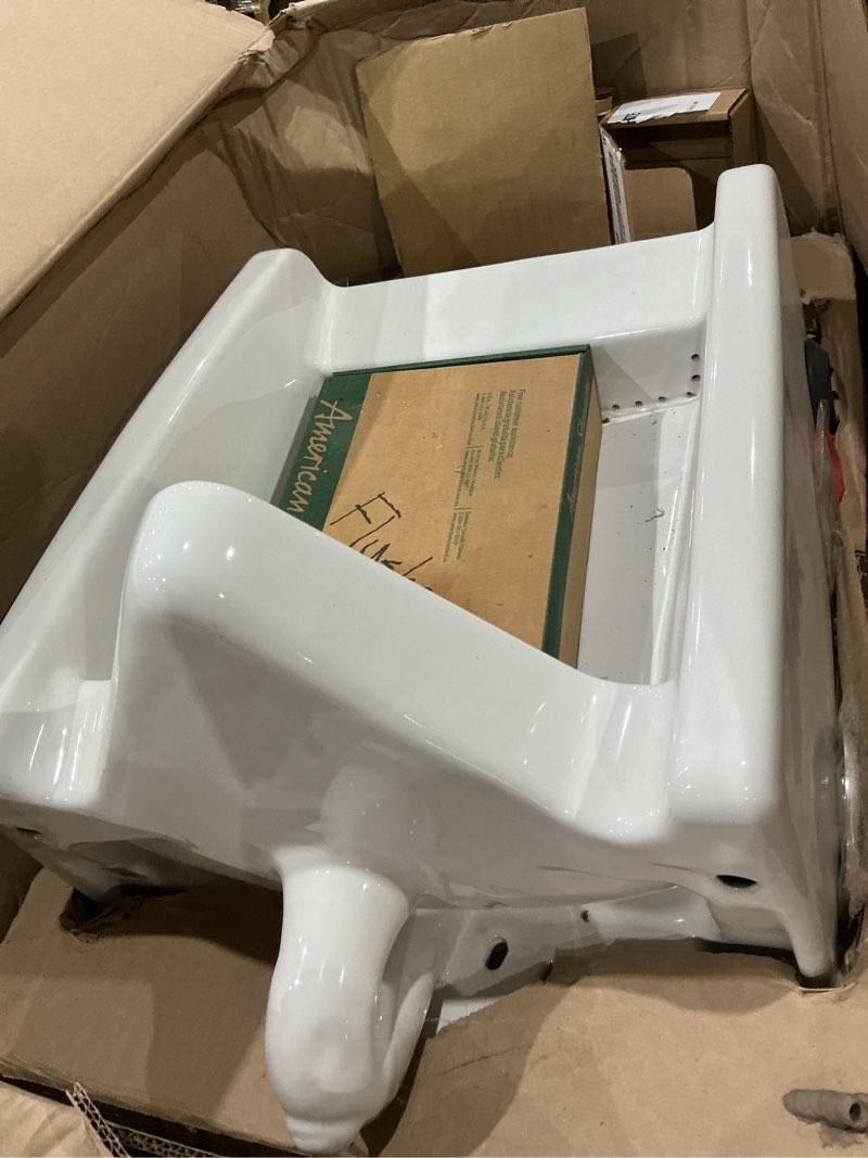 Condition photo showing As Is for washbrook flowise top spud 0.125 gpf urinal in white