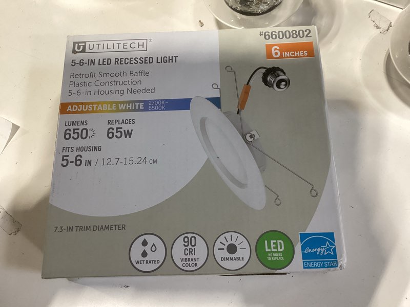 Condition photo showing As Is for 500+ bought last week utilitech white 6-in 650 -lumens switchable white round dimmable led wet rated recessed downlight item #6600802 | model #mqtl1281-l65k9027
