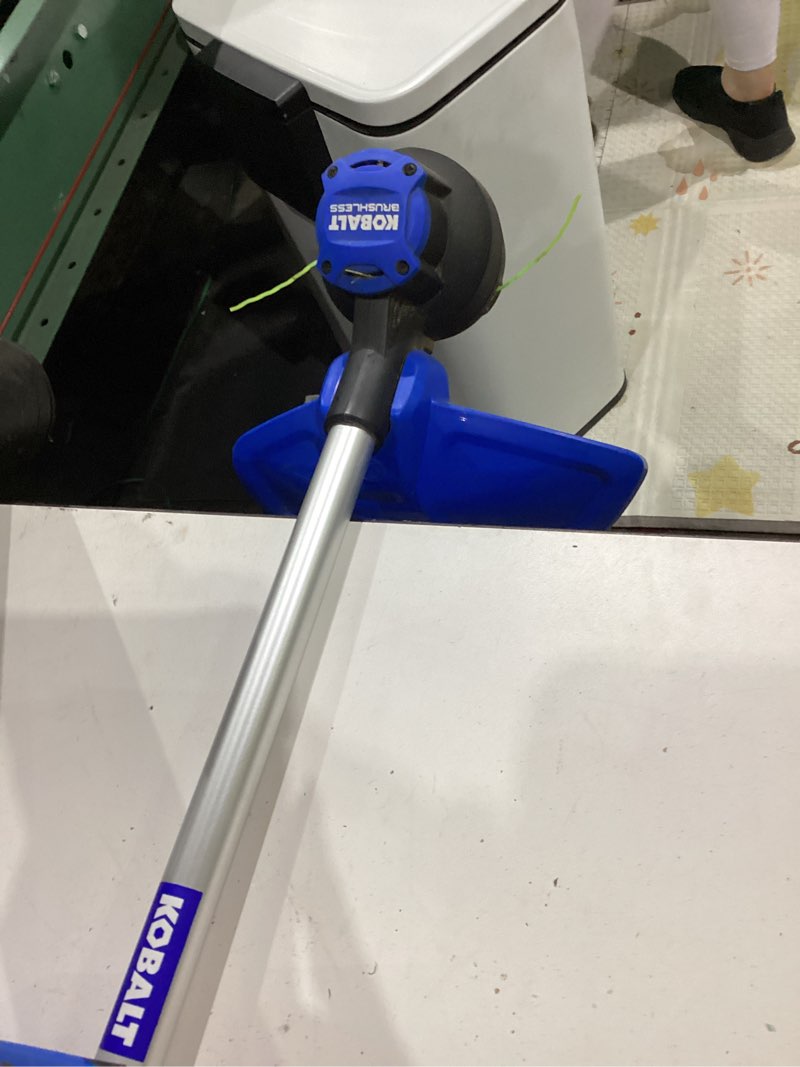Condition photo showing As Is for kobalt gen 24-volt 15-in straight shaft battery string trimmer 4.0 ah