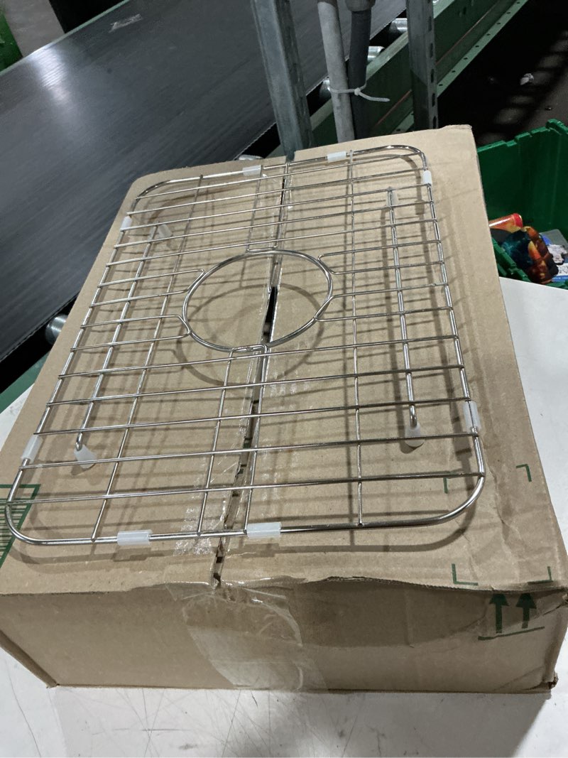 Condition photo showing As Is for sink grid, stainless steel
