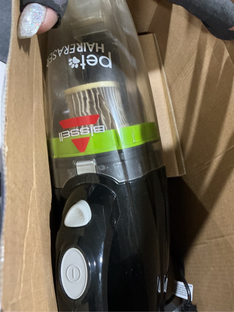 Condition photo showing As Is for bissell pet hair eraser cordless hand vacuum, home, auto, and pet vacuum, crevice tool, upholstery tool, and motorized brush included, 1782 hand vacuum only