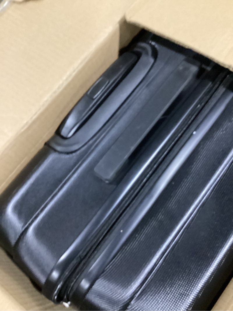 Condition photo showing Good Condition for amazon basics 30" hardside large checked luggage, hardshell suitcase with wheels, expandable for up to 15% more space, with scratch-resistant surface, four multi-directional wheels, black black large checked