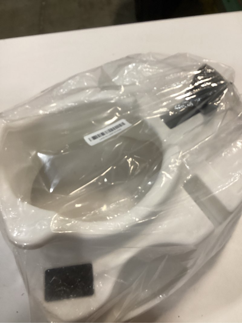 Condition photo showing Good Condition for Carex E-Z Lock Raised Toilet Seat, Elongated Toilet Seat Riser, Adds 5 Inches of Height, 300 lbs Capacity, Elevating and Raising Seat for Elderly and Handicap, Universal, Slip-Resistant, White