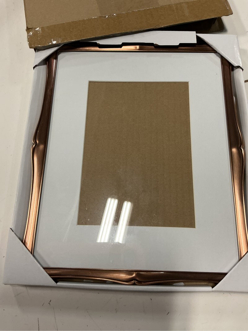 Condition photo showing New/Like New for 8 x 10'' premium alloy bronze finish photo frame with acid free 5x7'' mat - vintage style hi end décor frames 5x7'' with velvet back for desktop and wall hanging. 8x10''mat 5x7''(1pk) bronze