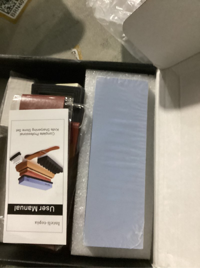 Condition photo showing Good Condition for Intelitopia Complete Knife Sharpening Stone Set – Dual Grit Whetstone 400/1000 3000/8000 Knife Sharpener with Leather Strop, Flattening Stone, Bamboo Base, 3 Non-slip Rubber Bases & Angle Guide