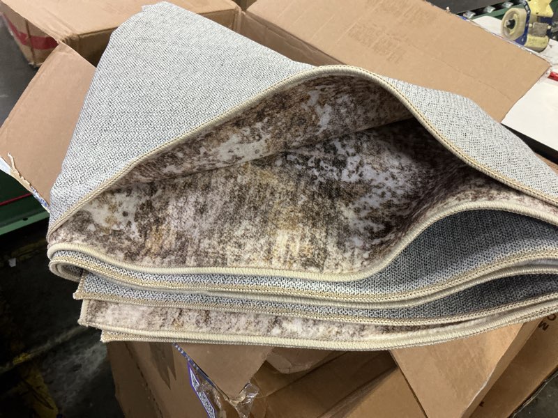 Condition photo showing Good Condition for 7x9 washable area rugs for living room, non slip soft large rugs for bedroom dining room, modern abstract low pile stain resistant carpet for laundry office home decor - gold brown gold brown 7x9