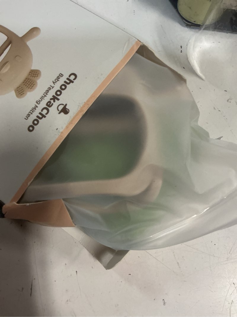 Condition photo showing New/Like New for chookachoo 2 pack baby teething toy silicone teething mitten for babies over 3 months anti dropping wrist hand teethers baby chew toys for sucking needs, bpa free green & caramel