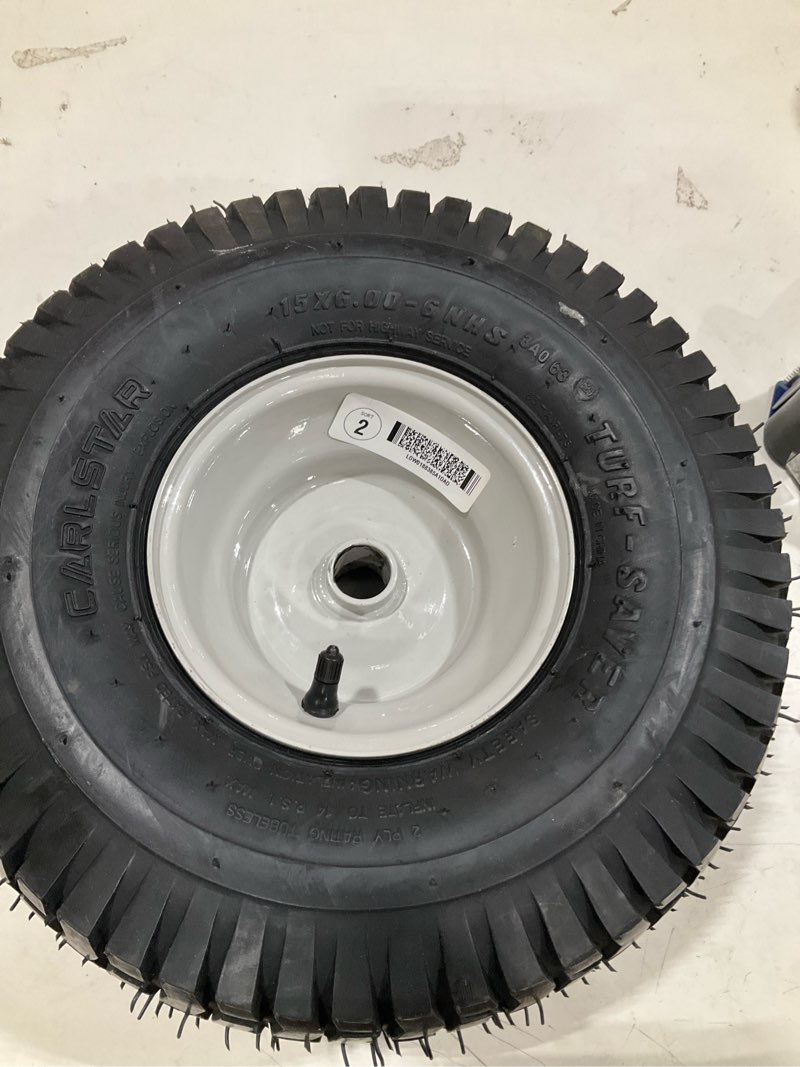 Condition photo showing As Is for carlstar 15x6.00-6 turf tire