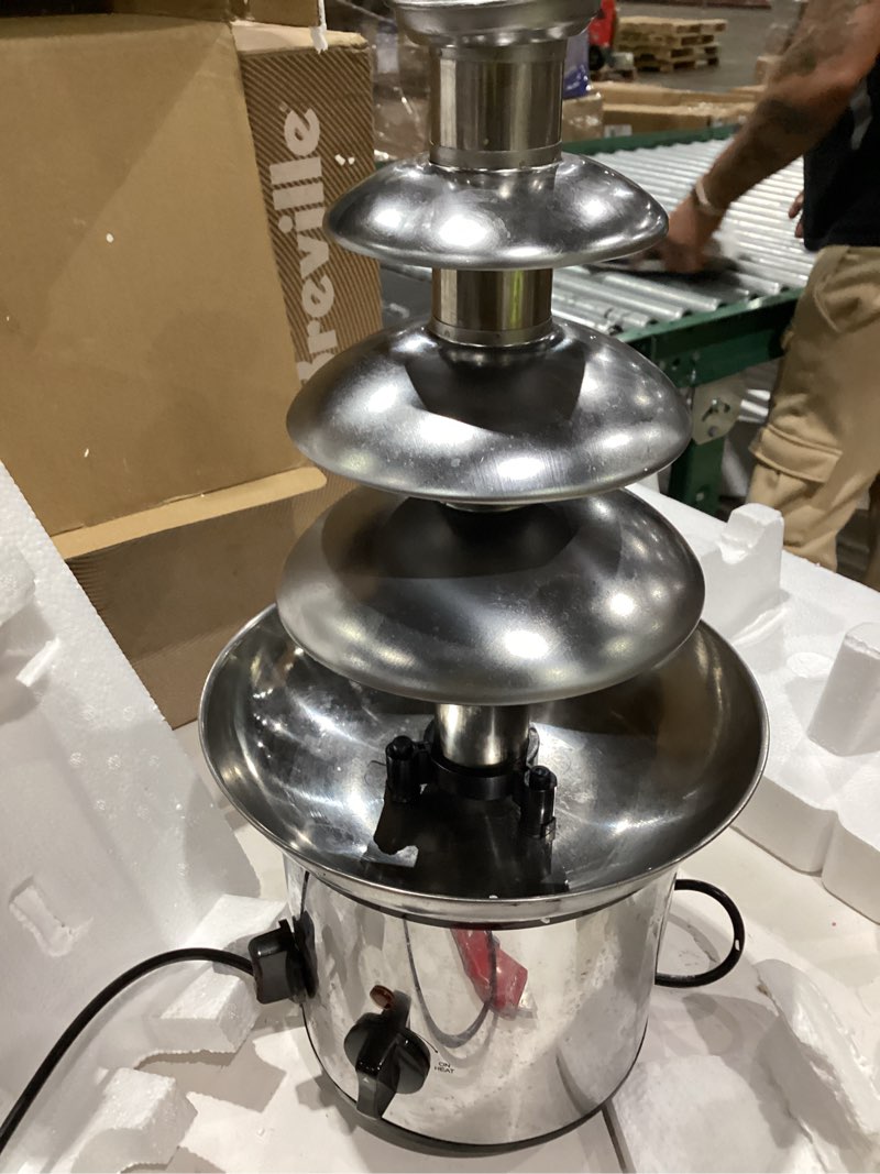 Condition photo showing As Is for chocolate fountain machine – electric stainless steel fondue fountain, 4-tier, 4-pound capacity for chocolate, candy, butter & cheese, heated bowl & dual controls