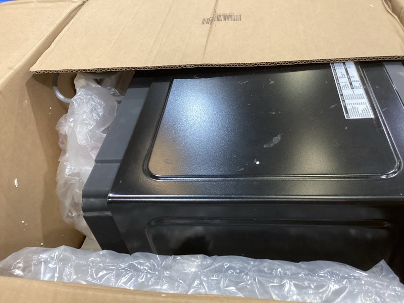 Condition photo showing As Is for toshiba em131a5c-bs countertop microwave ovens 1.2 cu ft, 12.4" removable turntable smart humidity sensor 12 auto menus mute function eco mode easy clean interior black color 1000w 1.2 cu.ft