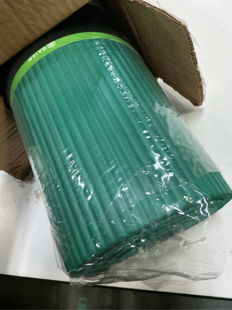 Condition photo showing Good Condition for gaiam yoga mat, pilates & exercise mat, thick 2/5" (10mm) workout mat with easy-cinch carrying strap for home & gym workouts green 2/5" (10mm)