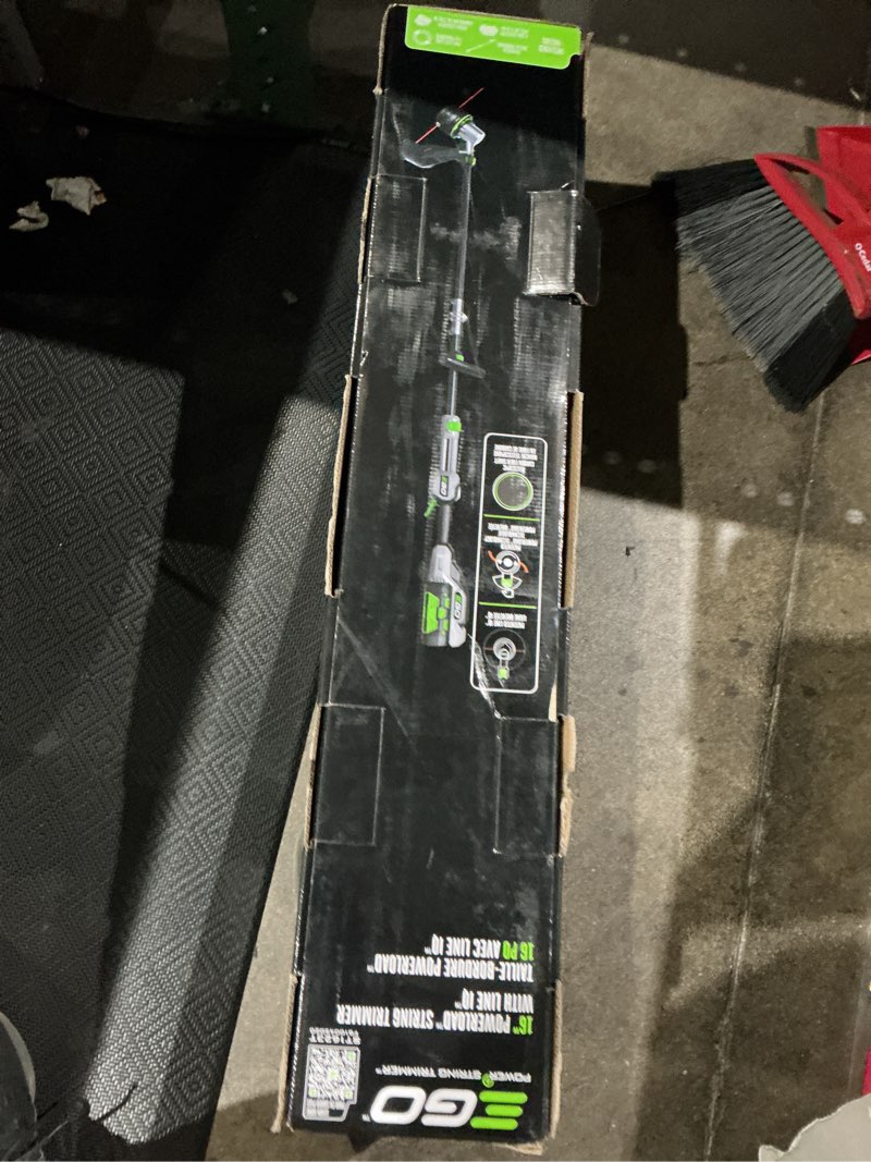 Condition photo showing As Is for ego power+ line iq with powerload st1623t 16 in. 56 v battery string trimmer kit (battery & charger) w/ telescopic shaft & 4.0 ah battery