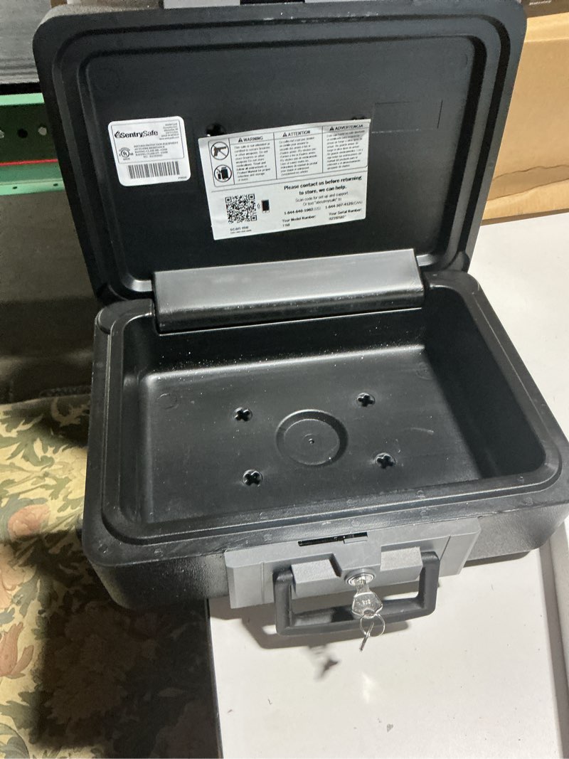 Condition photo showing Good Condition for SentrySafe Fireproof Safe Box with Key Lock, Chest Safe with Carrying Handle to Secure Money, Jewelry, Documents, 0.25 Cubic Feet, 6.3 x 15.3 x 12.1 Inches, 1160