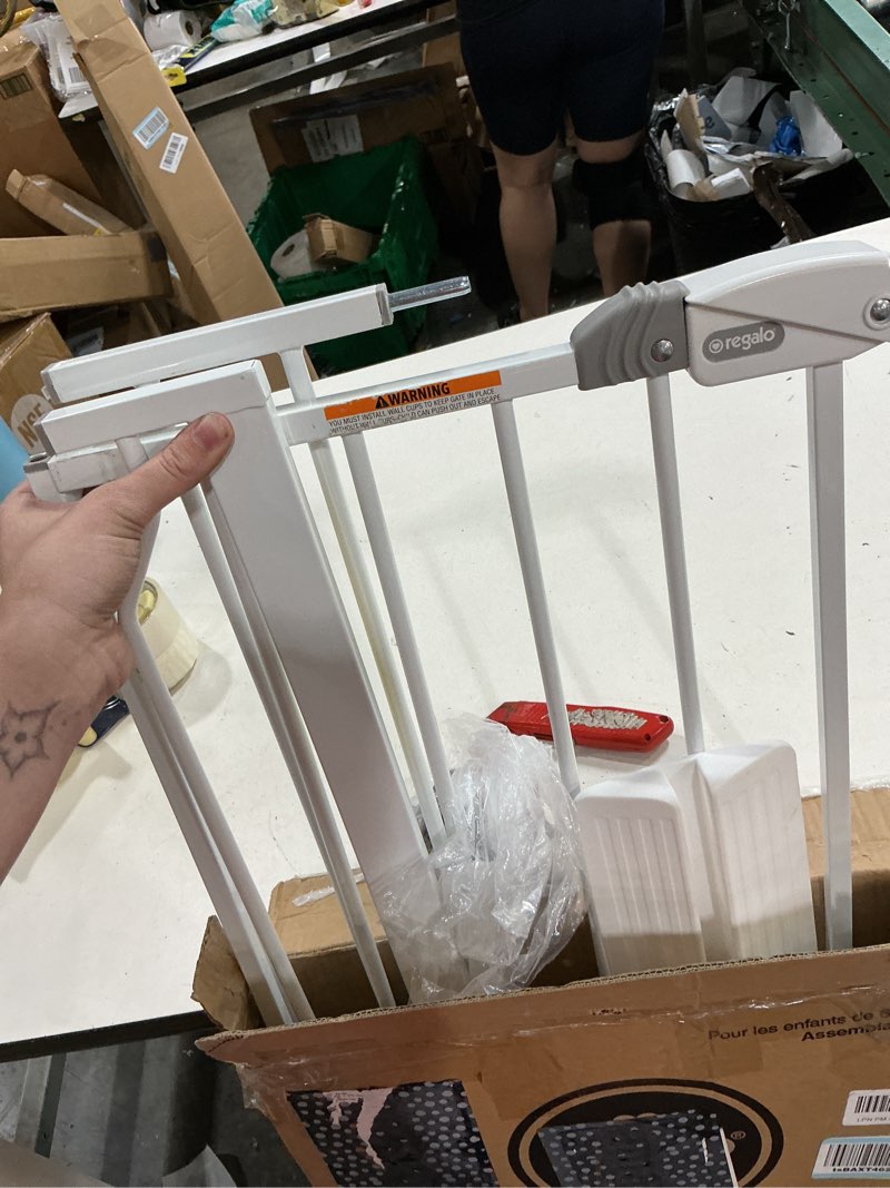 Condition photo showing Good Condition for regalo safety 29-38.5" baby gate for doorways & bottom of stairs, pressure mounted baby gate with door for babies, toddlers & pets, tested & safe for 30 years, american designed, american owned, white white 29-38.5"w x 30"h