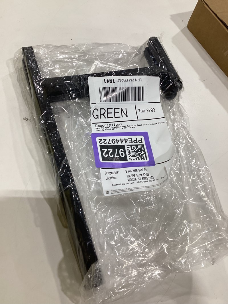 Condition photo showing New/Like New for Deco 79 Metal Solid Easel with Foldable Stand, 12" x 1" x 11", Black