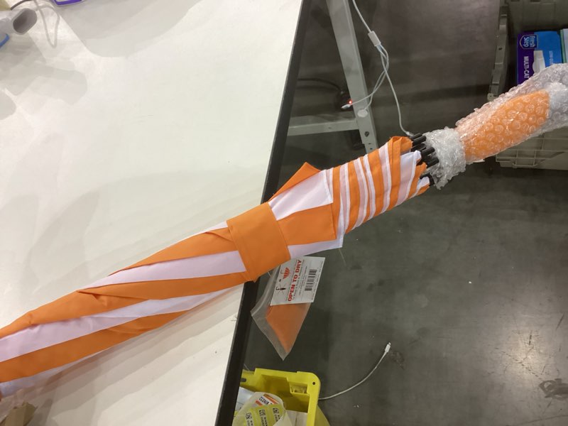 Orange and white umbrella