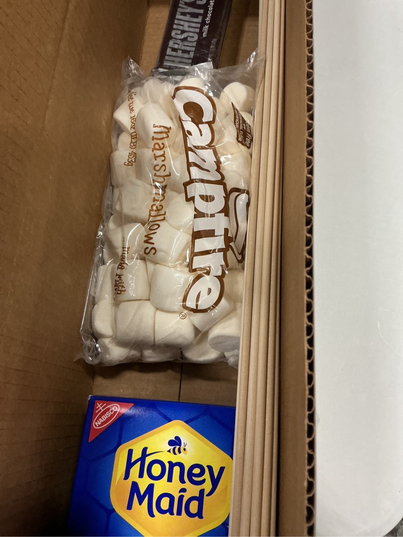Condition photo showing New/Like New for (hersheys best by 06/2026, gram crackers best by 03/21/26, marshmallows best by 04/11/26)s’mores kit