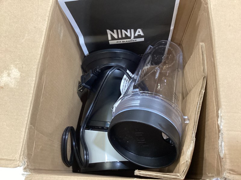 Condition photo showing As Is for ninja fit compact personal blender | for smoothies, shakes & frozen drinks | (2) 16-oz. to-go cups with spout lids | 700-watt countertop | black | qb3001ss push to blend